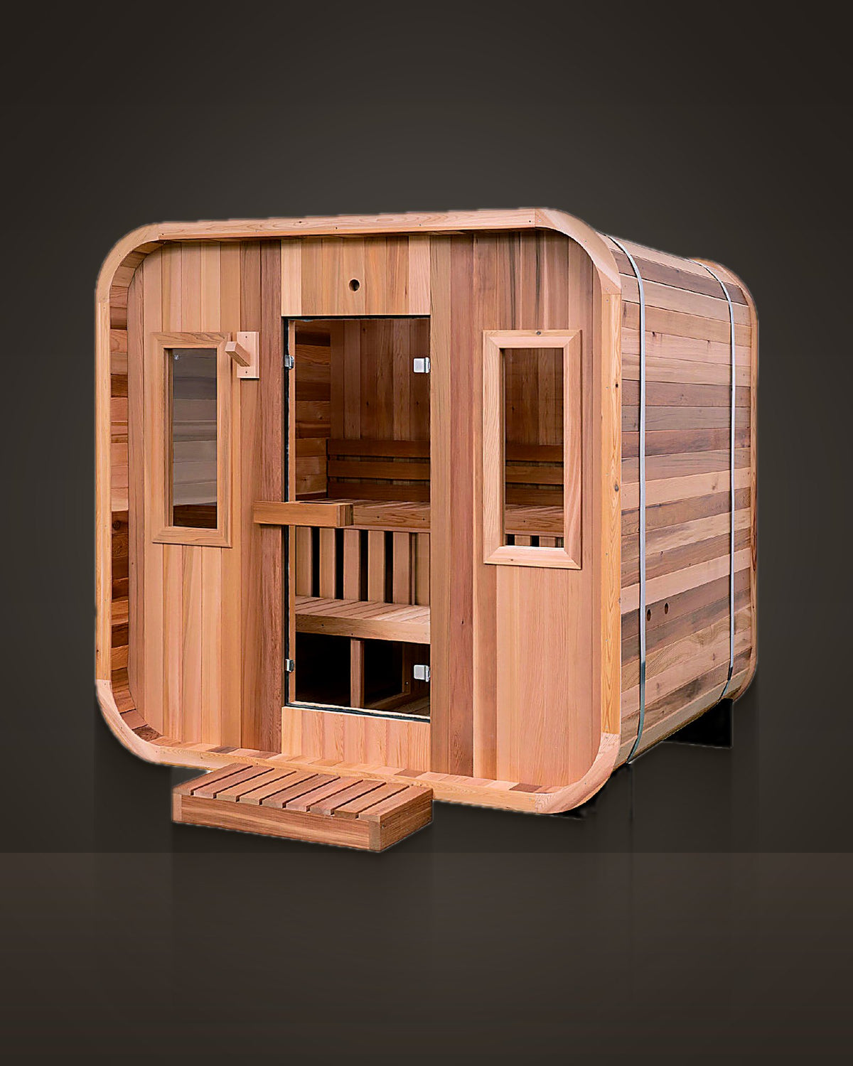 Cove 6: outdoor rounded sauna, clear red cedar, untreated. Glass door and two framed side windows.