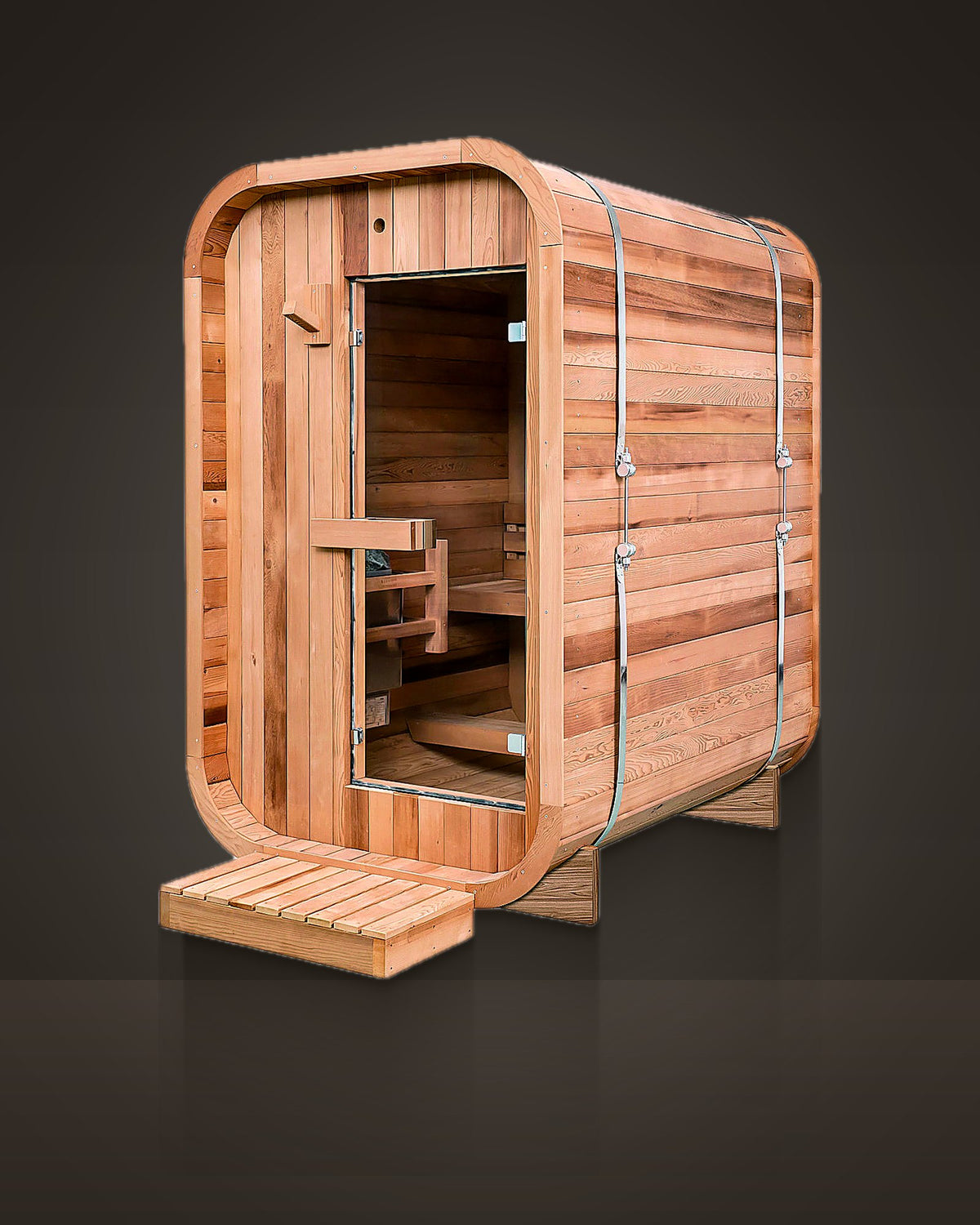 Cove Cedar 2: outdoor rounded sauna, red cedar with stainless steel bands. Full-height glass door.
