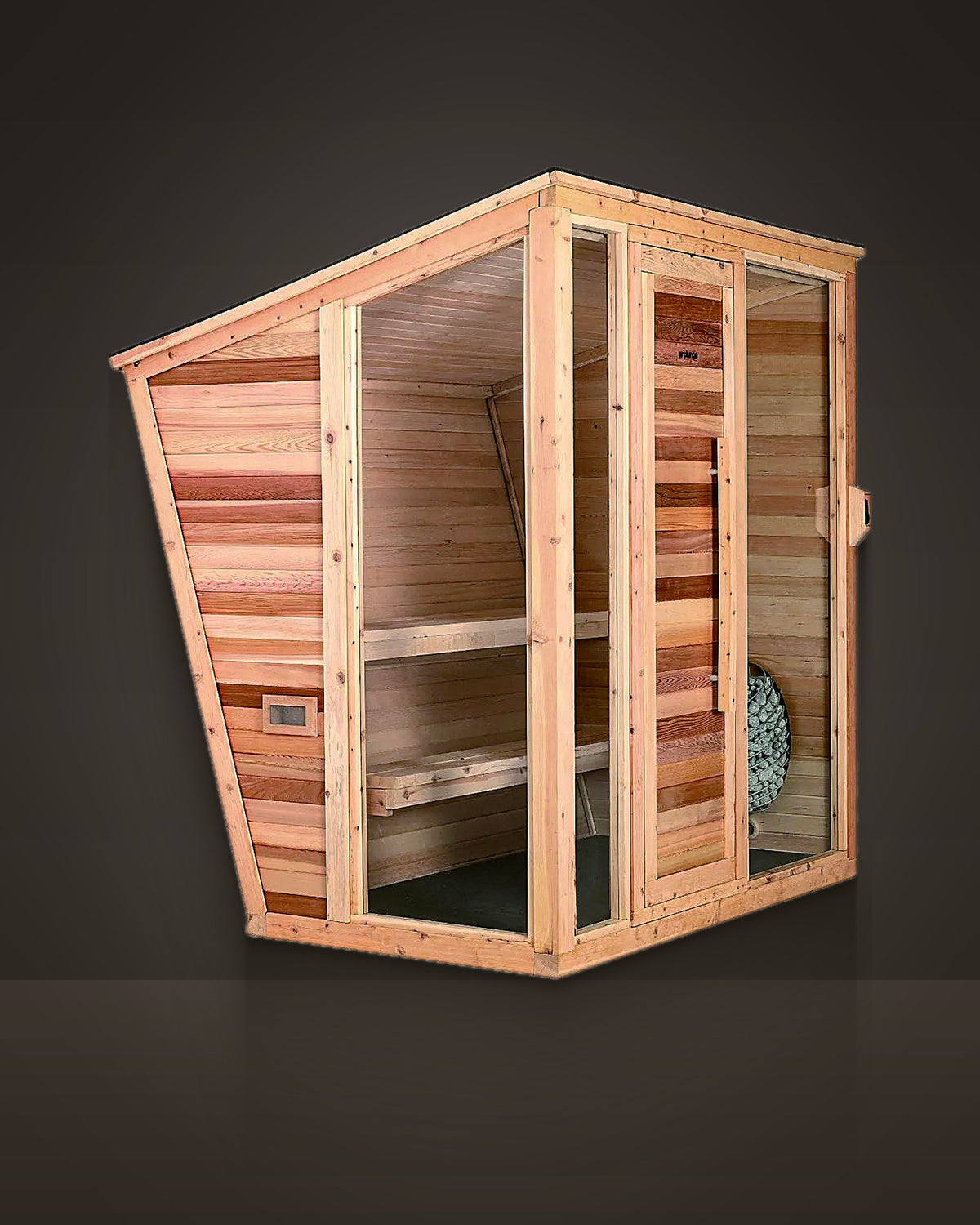 Eave Cedar 6: outdoor pitched-roof sauna, mixed-tone cedar, mono-pitch roof, raked front. Large fixed glass panels; solid timber door.
